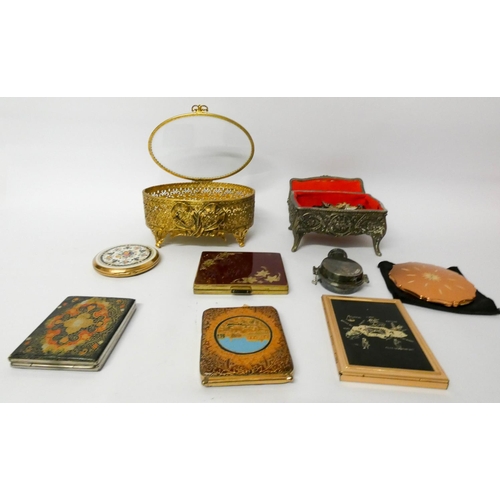 53 - A collection Stratton and other compact's in two trinket boxes and a cased perfume bottle...