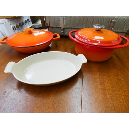 341 - Two Le Creuset style pots with lids and one Le Creuset dish