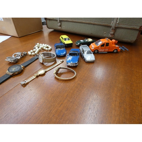 346 - A small quantity of costume jewellery and a small quantity of watches (as found)