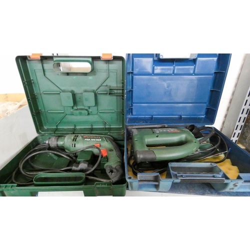 387 - A large storage box containing screws, nuts, bolts etc, Bosch electric jigsaw and a Bosch drill