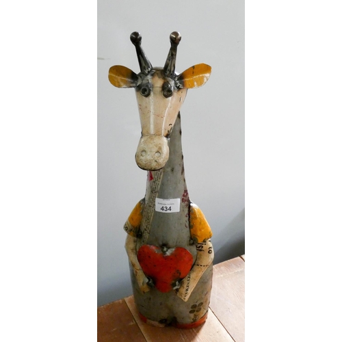 434 - A painted recycled tin model of a giraffe