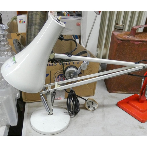 326 - A cream coloured angle poise lamp and a red coloured one