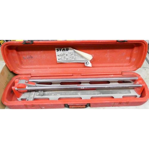 335 - A diamond wheel tile cutter and a hand tile cutter