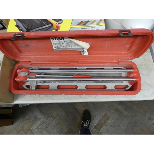 335 - A diamond wheel tile cutter and a hand tile cutter