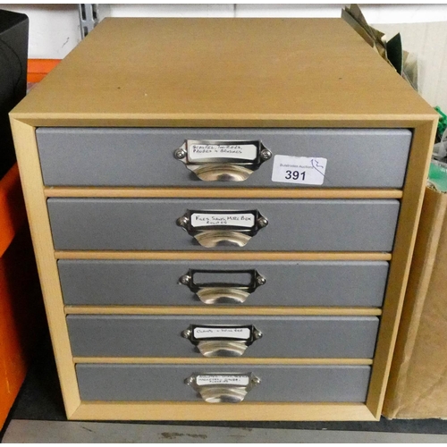 391 - A small table top five drawer cabinet containing hand tools and a large box containing cable ties, s... 