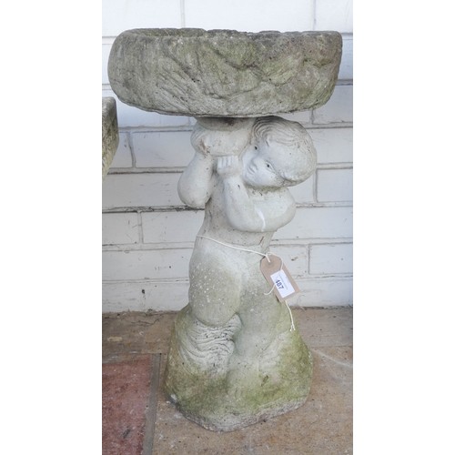 487 - A cherub reconstituted stone bird bath with removable top