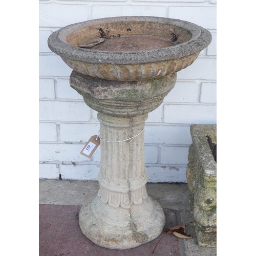 493 - A classical column circular bird bath with a removable top