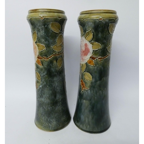 532 - A pair of Royal Doulton stoneware vases decorated with pink roses on a green marbled ground, height ... 