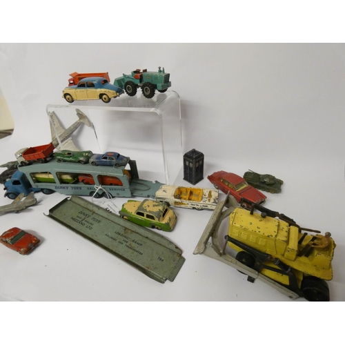 217 - A Dinky toy Pulmore Car Transporter 982with ramp and various other Dinky toys, in played with condit... 