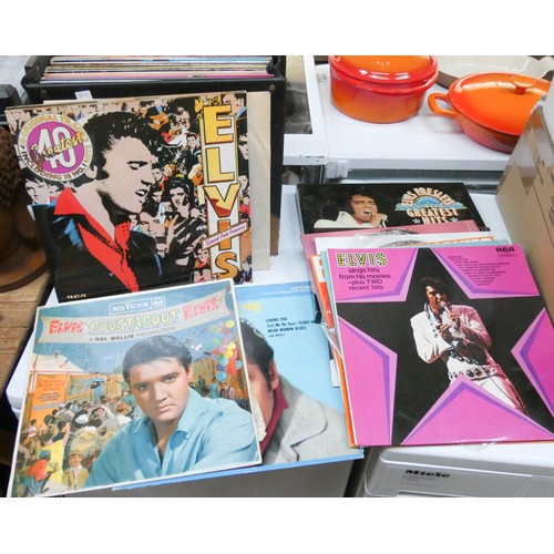 342 - A large quantity of Elvis Presley books, full size poster and a quantity of Elvis Presley LP's inclu... 