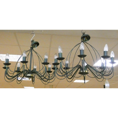 192 - A pair of eight branch decorative metal chandeliers
