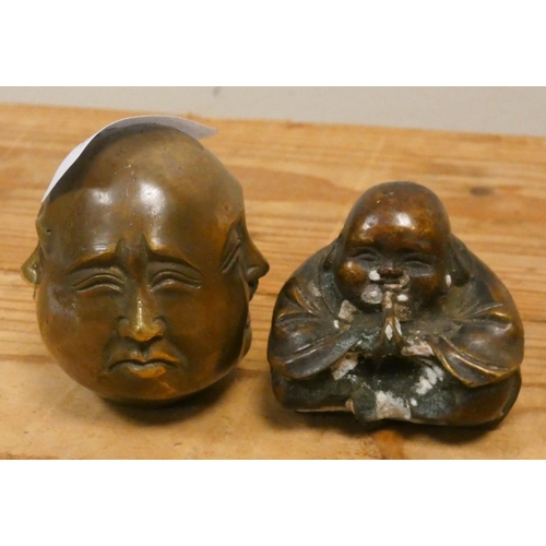 207 - Two bronze Buddha paperweights