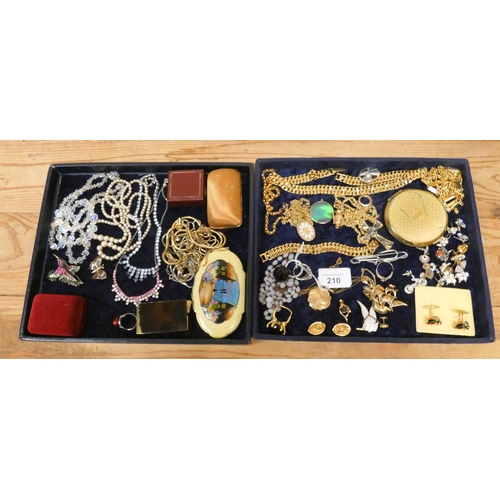 210 - A collection of vintage jewellery, compacts, beads etc