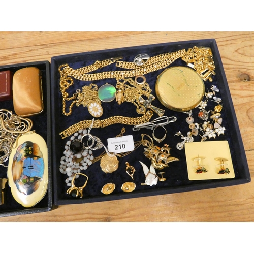 210 - A collection of vintage jewellery, compacts, beads etc