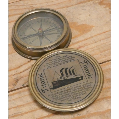 213 - A brass hand held Titanic commemorative compass