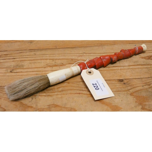220 - A coral handled Chinese paintbrush