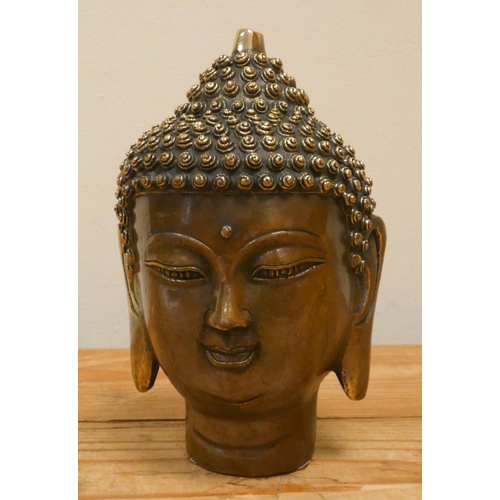221 - A Buddha head paperweight