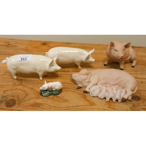 222 - Two Beswick models of pigs, a small Doulton pig and two Aynsley pigs