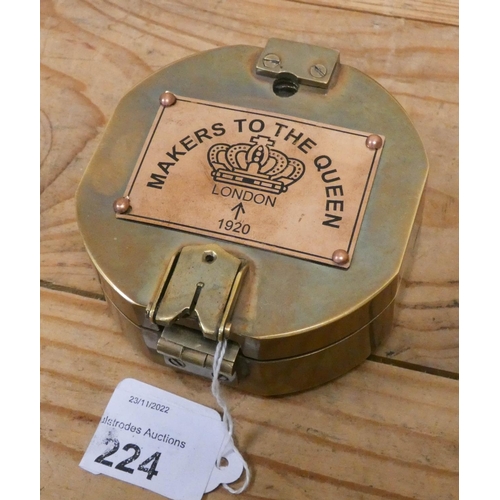 224 - A heavy brass compass