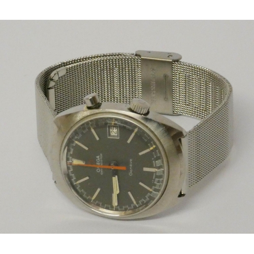 628 - A vintage Omega Chronostop Geneve wrist watch. The watch having a grey face with baton markers to th... 