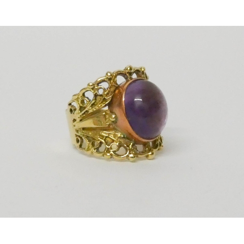 624 - Handmade yellow metal and amethyst ladies dress ring, ring size L