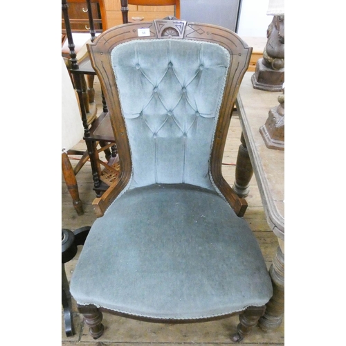 66 - An Edwardian nursing chair upholstered in blue buttoned fabric