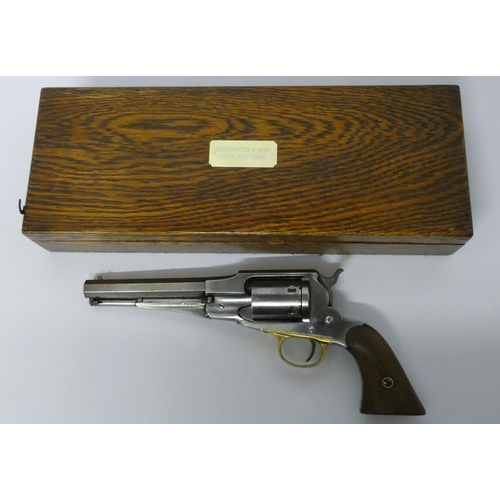 745 - Remington rimfire 6 shot police revolver, engraved barrel Patented 1863. In oak fitted case