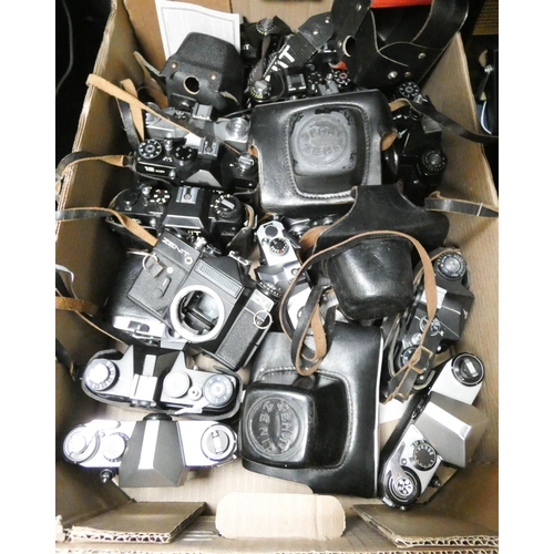 344 - A large box of cameras, camera accessories etc