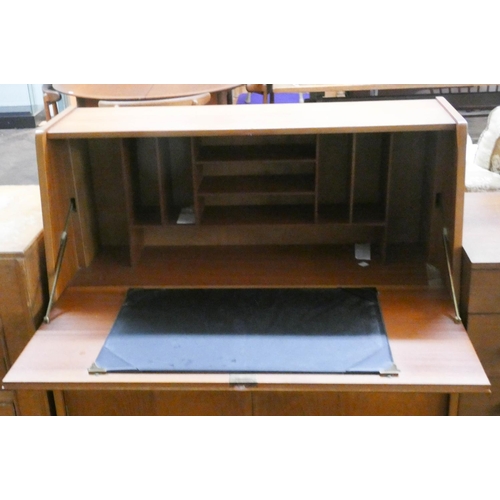 109 - A Remploy teak bureau with drawers and cupboards under, 3' wide