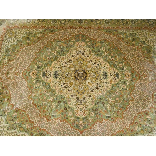 60 - A Salome Wilton green and patterned Persian design carpet, 11' X 8'3 approximately