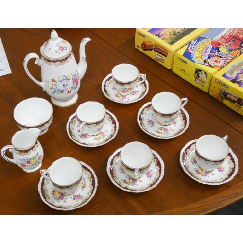 62 - A Roslyn floral decorated bone china coffee service of 15 pieces