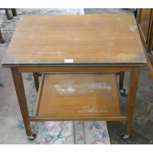 142 - A two tier teak tea trolley with fold over card table top