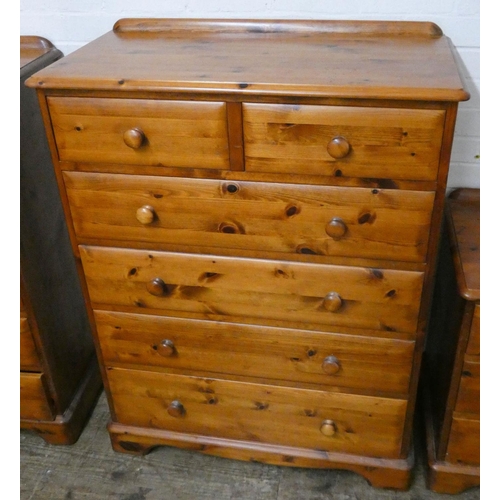 208 - Varnished pine tallboy chest of two short and four long drawers