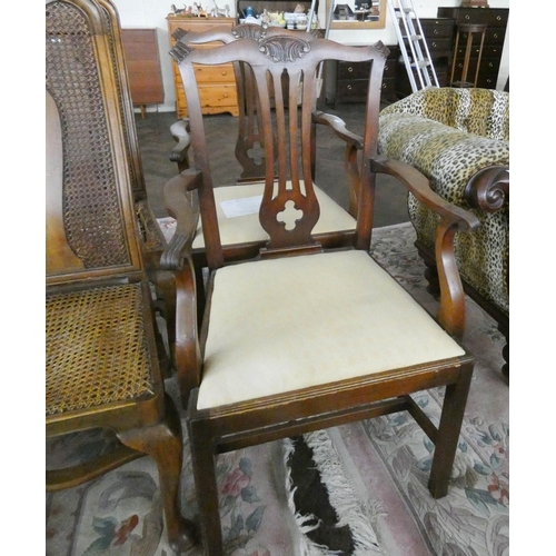 149 - A pair of Chippendale style elbow chairs in mahogany, together with a pair of Queen Anne style walnu... 