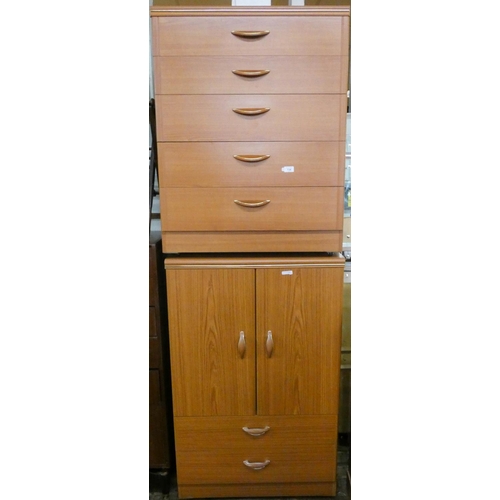134 - A modern teak tallboy fitted cupboards and two drawers and a matching chest of five drawers, each 2'... 