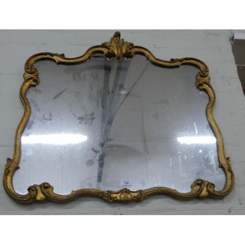 156 - A Victorian style shaped wall mirror in decorative gilt frame