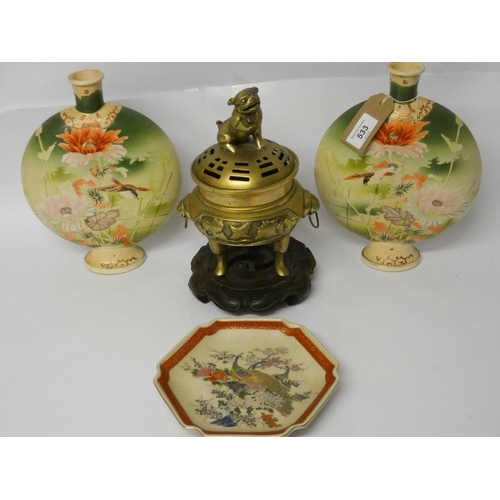 533 - A pair of Satsuma moon flask vases, a plate and a brass Koro and cover on hardwood stand