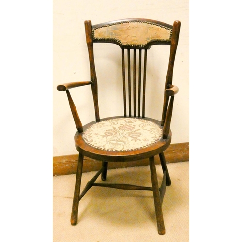 234 - An Edwardian round seat spindle back elbow chair with tapestry seat and back pad
