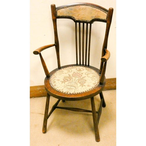 234 - An Edwardian round seat spindle back elbow chair with tapestry seat and back pad