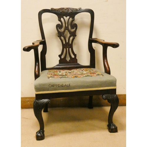 249 - A Chippendale style mahogany open arm chair with embroidered seat panel