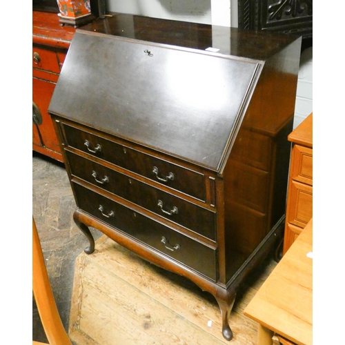 186 - A Georgian style mahogany bureau with three drawers under, standing on cabriole legs, 2'6