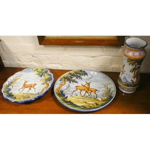 268 - Two Spanish pottery majolica deer decorated plates and a similar vase