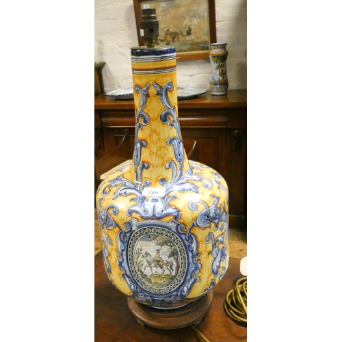 289 - A large Spanish pottery majolica style bottle vase shaped table lamp, 24