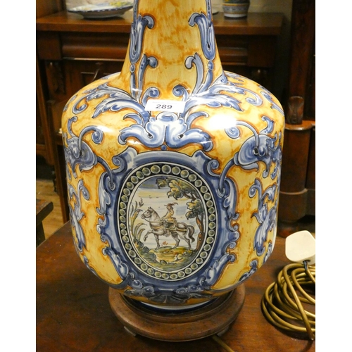 289 - A large Spanish pottery majolica style bottle vase shaped table lamp, 24