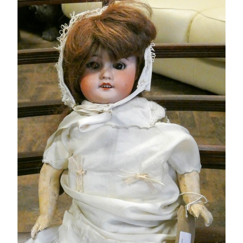 759 - French bisque doll, head numbered SFBJ 60 Paris, composition jointed body, 50 cms tall