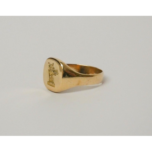 674 - A gents gold intaglio panel ring, ring size Y, weight 10.6 grams. Tests as 14ct gold.
