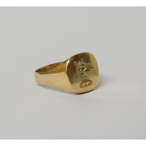 674 - A gents gold intaglio panel ring, ring size Y, weight 10.6 grams. Tests as 14ct gold.