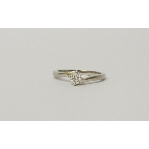 693 - Modern platinum and diamond solitaire engagement ring, the brilliant cut diamond in a cross over set... 