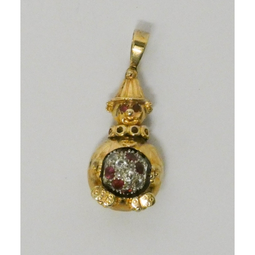 688 - Modern 9ct yellow gold Clown and ball pendant set with red and white stones. Gross weight 6.5 grams