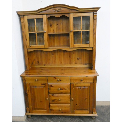 18 - A modern pine dresser with glazed cabinet back, drawers and cupboards under, 4'3 wide